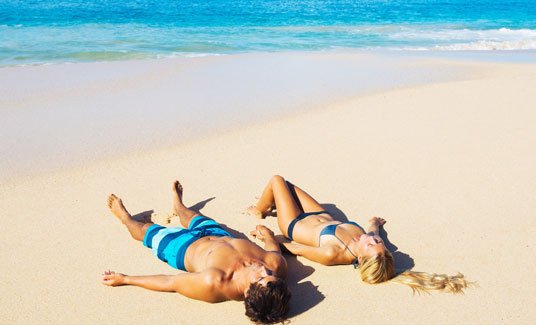 australian beach sunbath